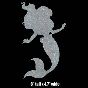 May include: Silver glitter mermaid silhouette, 8 inches tall and 4.7 inches wide.