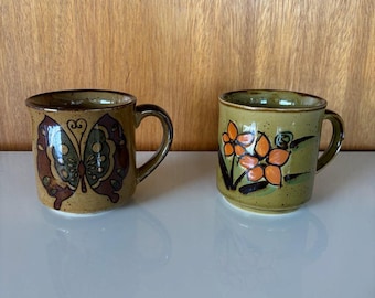 Vintage 1970's "Floral" Otagiri & "Butterfly" Quan Quan mugs, made in Japan. Sold separately.