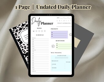 May include: A black and white daily planner with a digital tablet screen displaying a daily planner template. The template includes sections for mood, priority, schedule, reminders, meal tracking, and water intake. The template is undated.