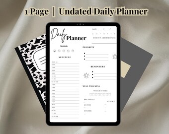 May include: A black and white daily planner with a simple design. The planner includes sections for mood, priority, schedule, reminders, and meal tracking. The planner is undated and can be used for any day of the week.