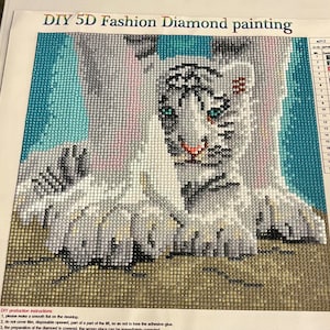 Completed Diamond Painting Art canvas. Snow tiger cub