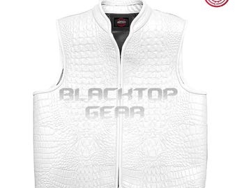 May include: A white, sleeveless vest with a textured, crocodile-like pattern. The vest has a zip-up front and a black interior lining. The brand name "BLACKTOP GEAR" is printed on the front of the vest.