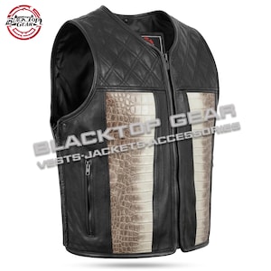May include: Black leather vest with a quilted upper section and a central panel featuring a reptile skin pattern in shades of brown and white. The vest has a zip closure and two vertical stripes. The brand logo is visible in the upper left corner.