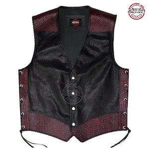 May include: Black leather vest with burgundy faux-crocodile panels on the shoulders and lower front. It has silver buttons and side lacing. The vest features a V-neck and braided trim. The Black Top Gear logo is visible.