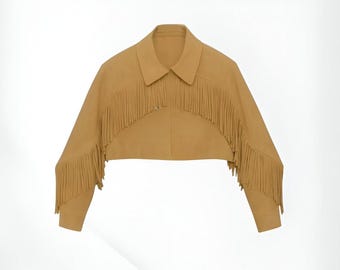 May include: A tan-colored cropped jacket with a collar and long sleeves. The jacket features decorative fringe along the front and sleeves. The garment is a western-inspired style.