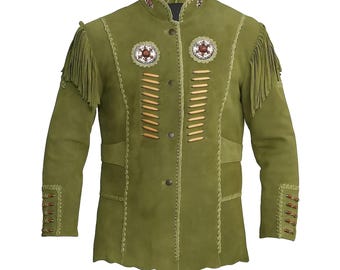 May include: Olive green suede jacket with fringe on the shoulders and sleeves. The jacket features decorative stitching, wooden accents, and two round embroidered patches on the chest. The collar and cuffs have detailed embellishments.