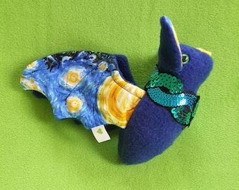 Murciélago de peluche de noche estrellada con ojos que brillan en la oscuridad