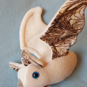 Wings of an Angel - bat plushie parody of Aziraphale