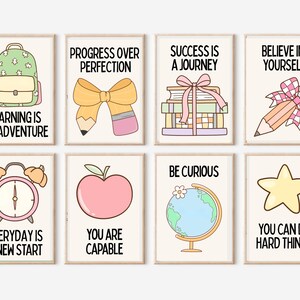 May include: Eight framed wall art prints featuring school-themed illustrations and motivational text: Learning is an adventure, Progress over perfection, Success is a journey, Believe in yourself, Everyday is a new start, You are capable, Be curious, You can do hard things.