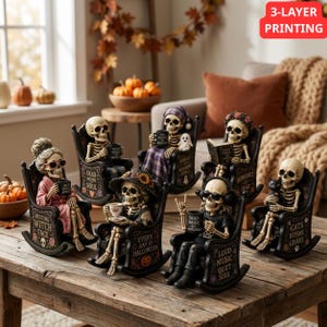 May include: A collection of six skeleton figurines sitting in black rocking chairs. Each skeleton has a unique accessory and text on the chair, including phrases like Resting Witch Face, Dead Inside Soul, Every Day Is Halloween, and Cats Before Grave.
