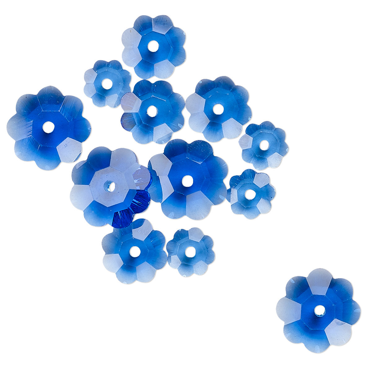 May include: A group of blue flower-shaped glass beads with a hole in the center. The beads are scattered on a white background.