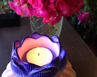 Lotus flower candle holder incredibly colorful.  Uniquely handcrafted with extensive detail.  Perfect gift for any occasion.