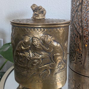 Vintage/antique brass lidded humidor canister, monkeys in a jungle design 8.5"