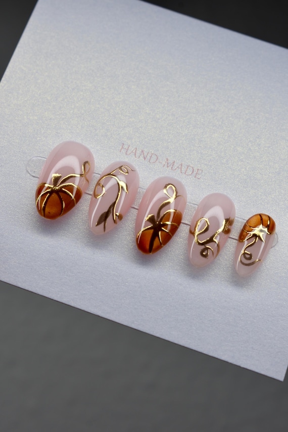 Handmade Cat Eye Gel Press-on Nails - Glowing Pumpkin Design