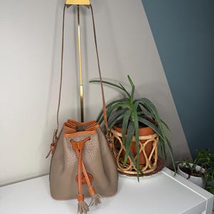 Vintage Dooney & Bourke AWL Drawstring Backpack Bone British Tan Leather USA Dooney & Bourke Tan/Black All Weather Leather Bucket  main image 3