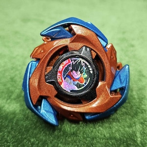 Beyblade x Takara Tomy Dran Brave custom painted. Dynamic Duo ser. Son Goku. (Blade, assist blade, and lock chip). No ratchet or bit inc.