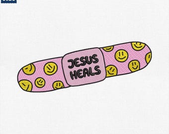 May include: A pink bandage featuring yellow smiley faces and the text "JESUS HEALS" in black. The bandage is approximately 10 cm wide. The design is set against a white background.
