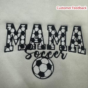 May include: White sweatshirt with black embroidery that says "MAMA Soccer" with a soccer ball design.