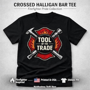 May include: Black t-shirt with a graphic featuring a crossed Halligan bar and axe design, with the text "TOOL OF THE TRADE" in a circular emblem. The shirt is part of the Firefighter Pride Collection and is unisex fit.