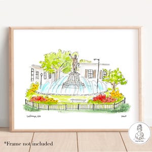 May include: A watercolor illustration of a fountain in a park in LaGrange, GA. The fountain is surrounded by trees and flowers. There is a statue of a man in the center of the fountain.