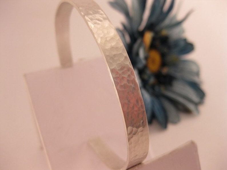 Free shipping to US locations Fits 6.5 to 7 inch wrist Hammered Sterling Silver Cuff Bracelet reduced rates to all other countries.