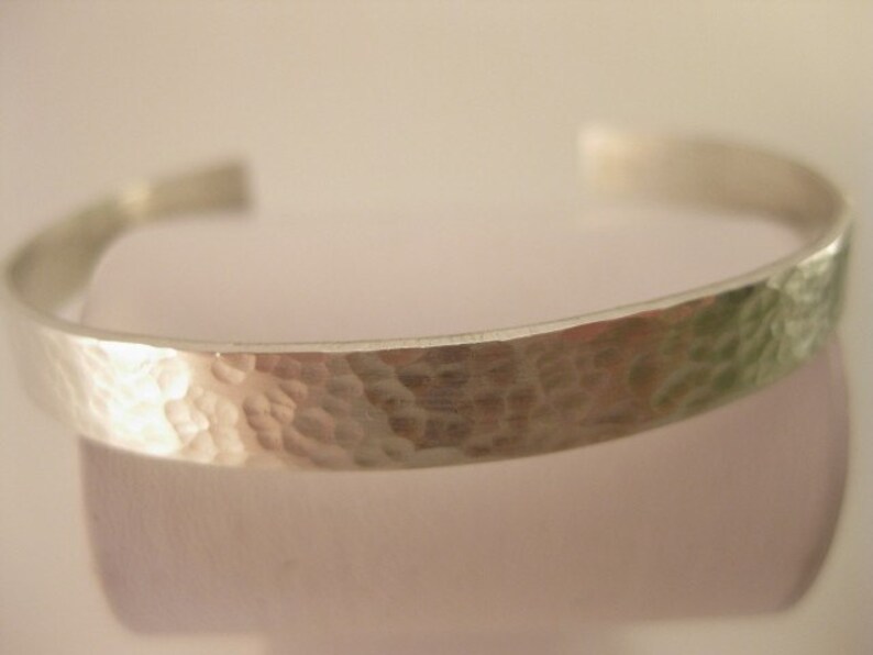 Free shipping to US locations Fits 6.5 to 7 inch wrist Hammered Sterling Silver Cuff Bracelet reduced rates to all other countries.