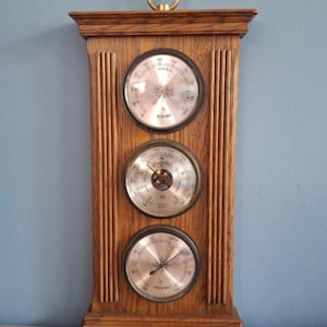 Vintage oak weather station from the Oisterwijk Furniture Factory. Hygrometer, barometer (mm), and thermometer.
