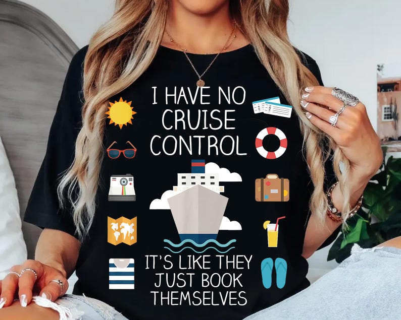 a woman wearing a black t-shirt with a humorous text and various icons related to travel and cruise control.