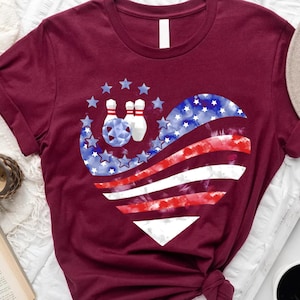 a t - shirt with a bowling design on it
