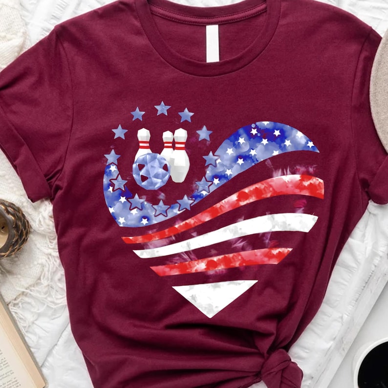 a t - shirt with a bowling design on it