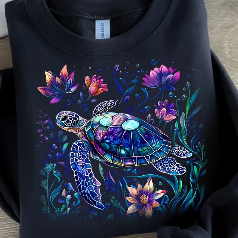 a t - shirt with a turtle and flowers on it