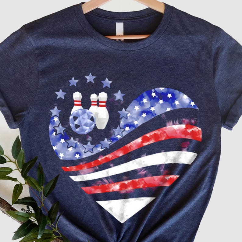 a t - shirt with a bowling ball in the shape of an american flag