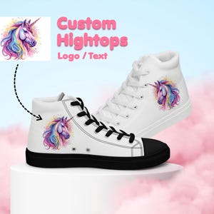 May include: White high-top canvas sneakers with a colorful unicorn illustration on the side. The text "Custom Hightops Logo / Text" is displayed above the shoes.