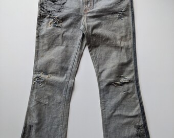 SS02 D & G Ölige Distressed Jeans