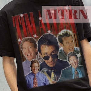 May include: Black t-shirt with a vintage-style graphic print of Tim Allen from the TV show "Home Improvement". The graphic features multiple images of Tim Allen in different poses. The shirt has a crew neck and short sleeves.