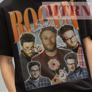 May include: Black t-shirt with a vintage-style graphic of a band called "Roogen" featuring a group of men with a flower. The text "Seth" is written in cursive above the band name.