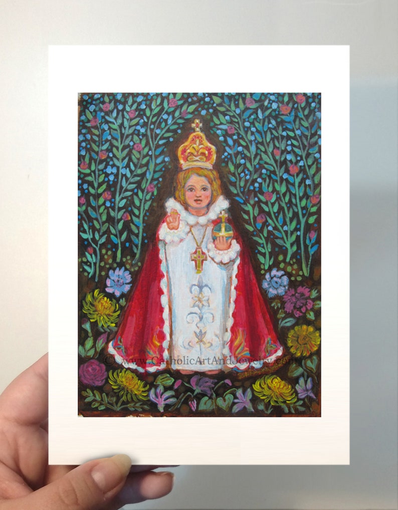 May include: A painting of a young child dressed in white and red robes, wearing a crown and holding a golden orb. The child is surrounded by a lush green garden with colorful flowers.