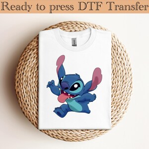 May include: A white ceramic mug with a black handle and the text "But first, coffee" in a handwritten style. The mug is likely 11-15 ounces, perfect for a morning beverage.