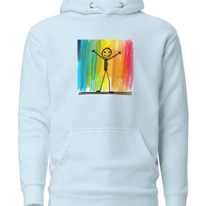 May include: A light blue hoodie with a pocket on the front. The hoodie features a graphic of a stick figure with a smiling face standing in front of a rainbow background.