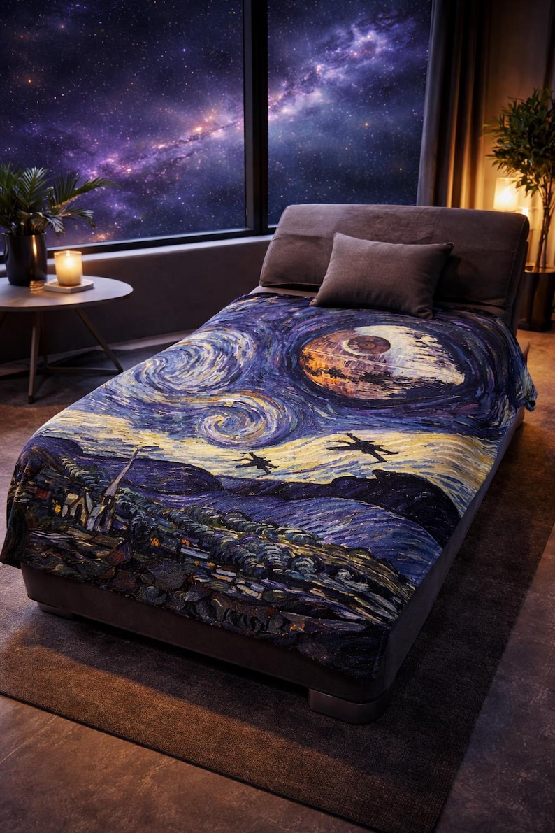 May include: A bed with a throw blanket featuring a starry night design with a Death Star and two TIE fighters. The blanket is primarily blue, yellow, and white. The room has a large window with a view of a galaxy.