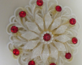 Vintage costume jewelry   / pearl looking brooch with red rhinestones 2 " by 2 "