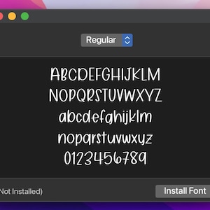 May include: A screenshot of a computer screen showing a font preview. The font is called "Regular" and is not installed. The font is a handwritten style with uppercase and lowercase letters and numbers. The letters are white and the background is black.