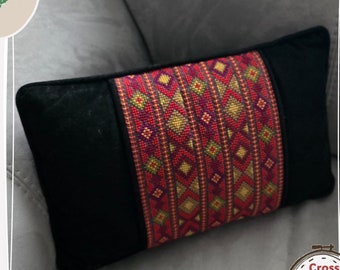 May include: A black pillow with a colorful geometric pattern embroidered on one side. The pillow is on a gray couch. The text "Digital Download PDF" is at the top of the image. The text "All proceeds will be donated to Gaza" is at the bottom of the image. The text "Cross Stitch Pattern ONLY" is in a circle at the bottom right of the image.