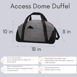May include: Gray and black Access Dome duffel bag, 18 inches long, 10 inches high, and 8 inches wide. Features include a front slip pocket, adjustable shoulder strap, and a spacious zippered main compartment. The bag has web handles.