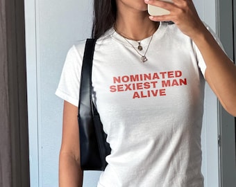Genomineerd baby-T-shirt voor meest sexy man: trendy crop-top-stijl jeugdshirt