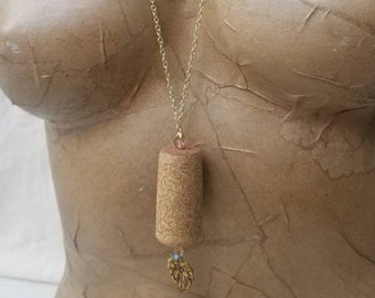 glass beads Wine Cork Pendant with Grape Leaf Motif embellished with nail heads and repurposed chain tassel.