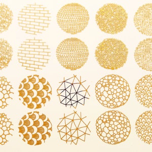 May include: Twenty gold-coloured circles with different patterns, including geometric, brick, and organic shapes. The circles are arranged in four rows of five.