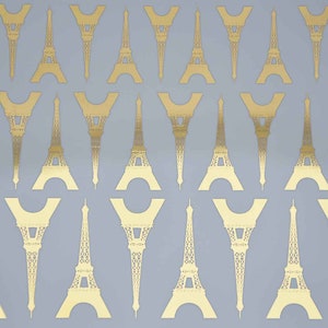以下が含まれることがあります： エッフェル塔の繰り返しパターンが施された金箔ステッカーのシート。これらのステッカーは、あらゆるプロジェクトにパリの雰囲気を加えるのに最適です。