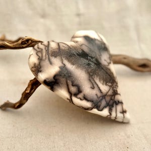 Horse hair raku ceramic heart. Feather memorial pottery.