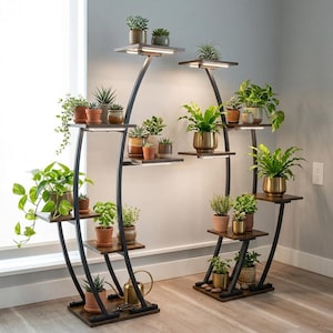 May include: A two-piece curved metal plant stand set with dark wood shelves and integrated LED grow lights. The structure holds numerous potted plants in various sizes, including trailing vines, succulents, and leafy green foliage in terracotta and gold pots.